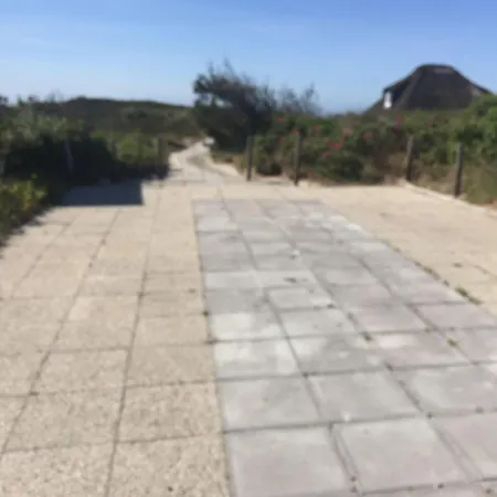 Meerblickhaus-hoppe-mit-panoramabank-auf-sylt * Hörnum